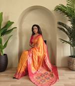 Orange Banarasi silk blend saree with zari weaving Meenakari design