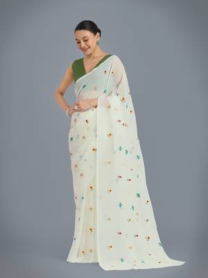 Cream georgette embroidered saree with unstitched blouse  3