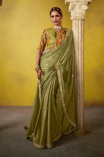 Olive green tissue zari ceremonial saree