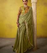 Olive green tissue zari ceremonial saree