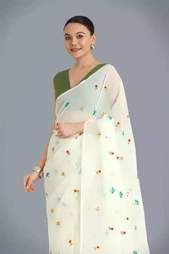 Cream georgette embroidered saree with unstitched blouse 