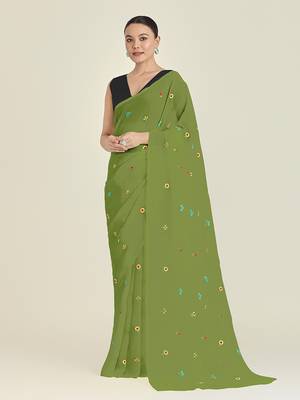 Green georgette embroidered saree with unstitched blouse  1