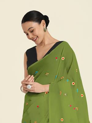 Green georgette embroidered saree with unstitched blouse  4