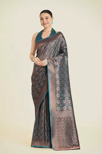 Teal banarasi silk blend woven saree with unstitched blouse
