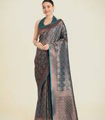 Teal banarasi silk blend woven saree with unstitched blouse