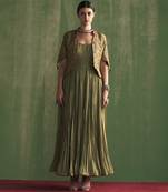 Green silk plain anarkali paired with embroidered jacket