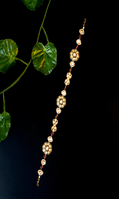 Elegant kundan floral matha patti with bead accents 1