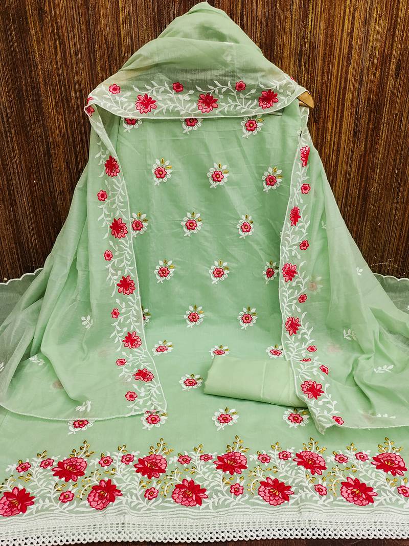 Green Charming chanderi cotton dress material with floral embroidery & lace detailing