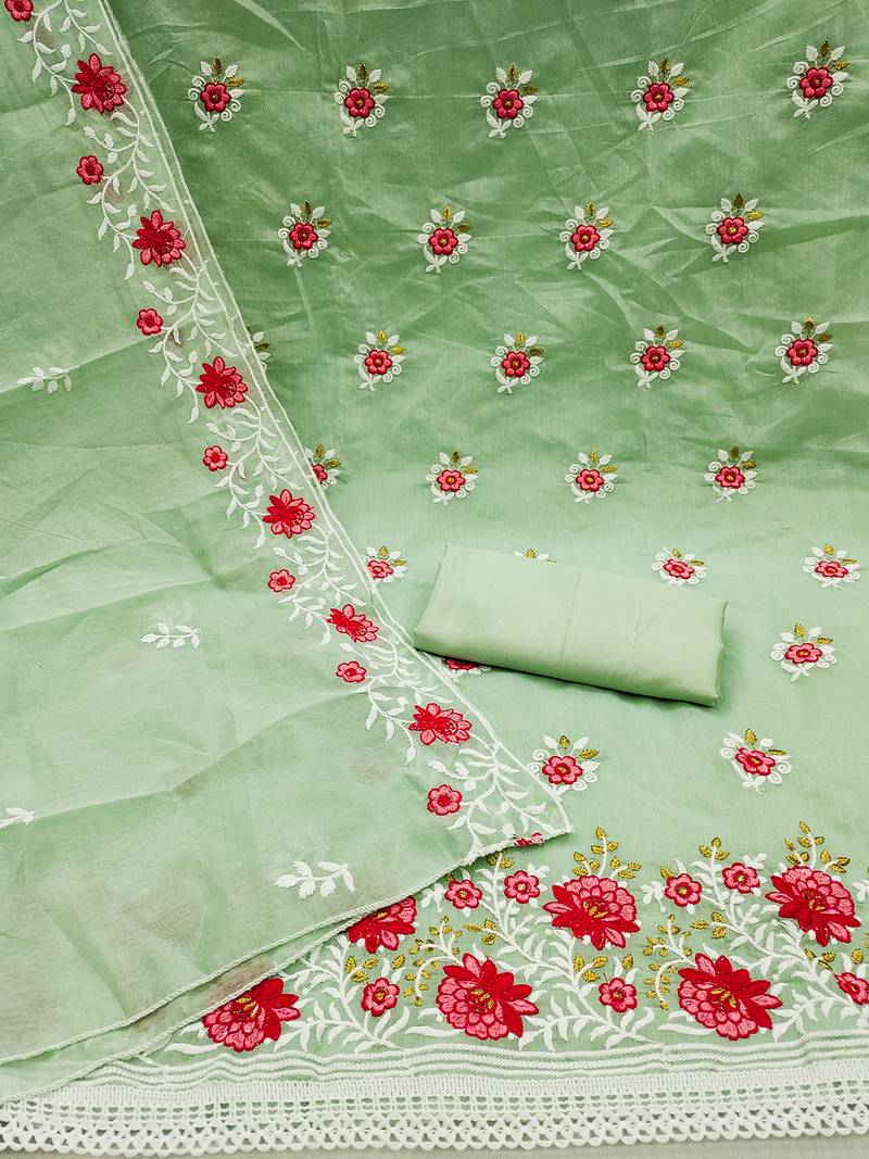 Green Charming chanderi cotton dress material with floral embroidery & lace detailing