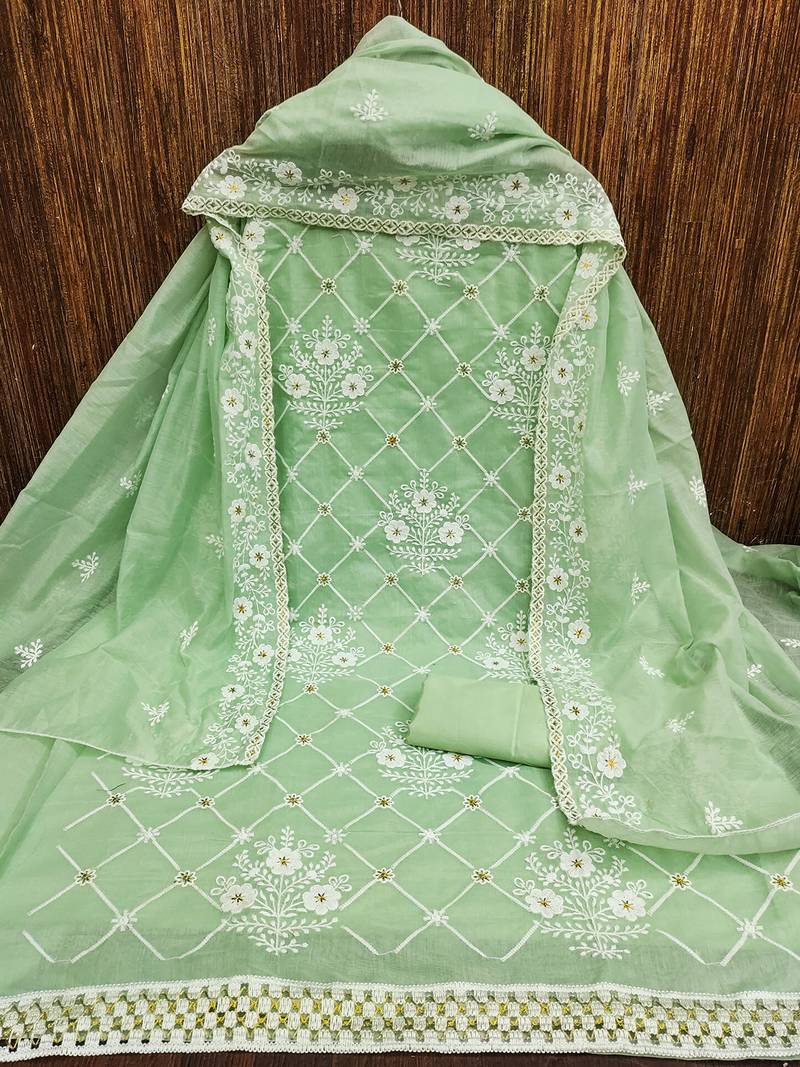 Green chanderi cotton dress material with white embroidery & floral lace dupatta