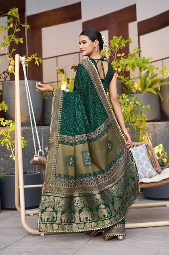 Dark green printed cotton silk saree with blouse piece