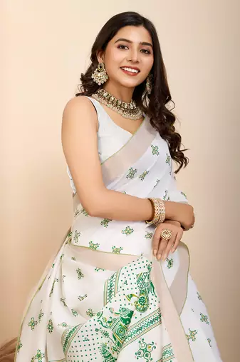 Green printed cotton silk saree with blouse piece