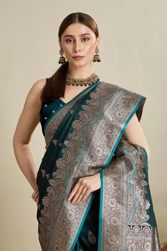 Dark green woven satin saree with blouse piece