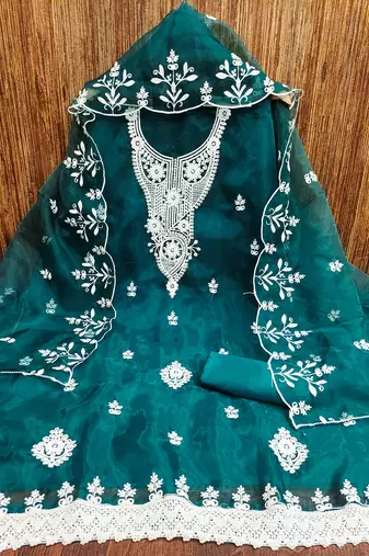 Teal powder organza suit set with intricate white thread embroidery