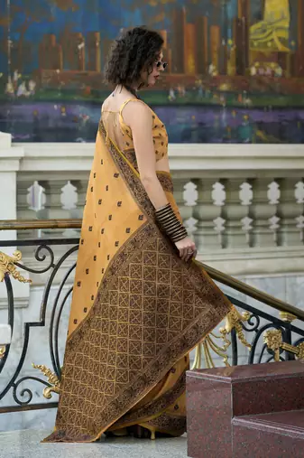 orange tissue silk blend saree with unstitched blouse
