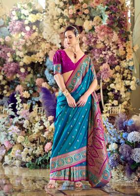 teal banarasi silk blend saree with unstitched blouse 1
