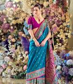 teal banarasi silk blend saree with unstitched blouse