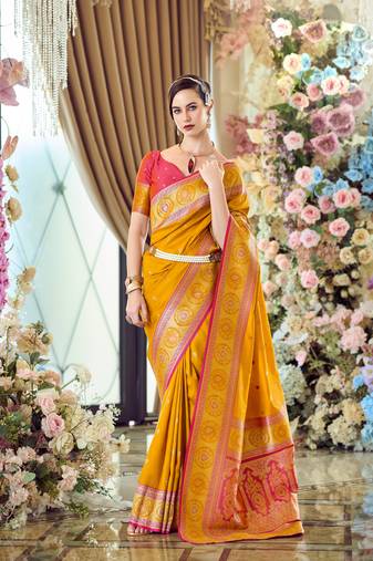 yellow banarasi silk blend saree with unstitched blouse