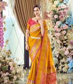 yellow banarasi silk blend saree with unstitched blouse