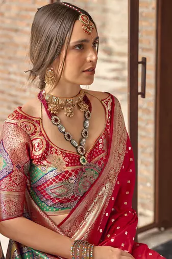 red soft silk blend saree with unstitched blouse