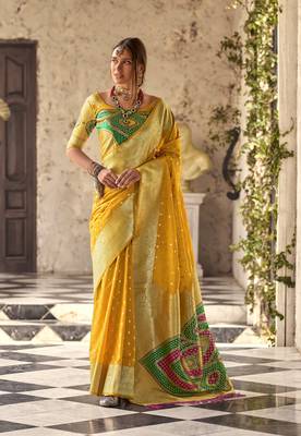 yellow soft silk blend saree with unstitched blouse 1
