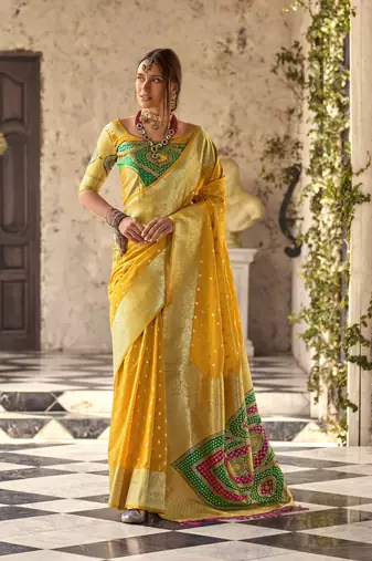 yellow soft silk blend saree with unstitched blouse