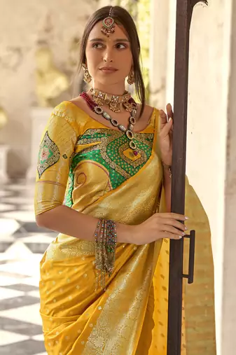 yellow soft silk blend saree with unstitched blouse