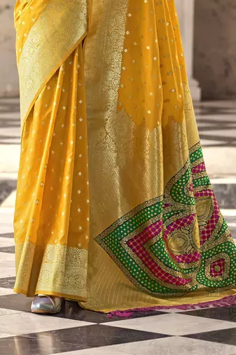yellow soft silk blend saree with unstitched blouse
