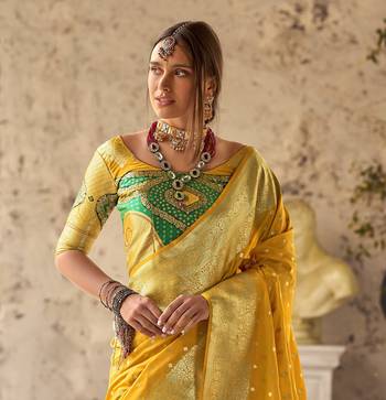 yellow soft silk blend saree with unstitched blouse 4