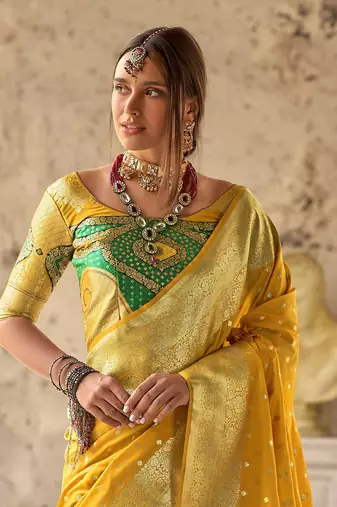 yellow soft silk blend saree with unstitched blouse