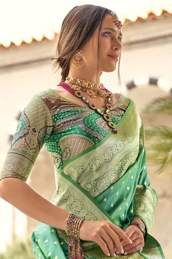 turquoise soft silk blend saree with unstitched blouse
