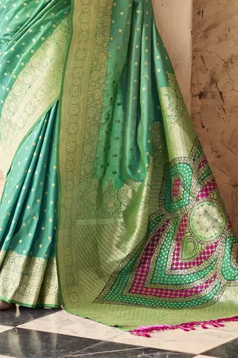 turquoise soft silk blend saree with unstitched blouse
