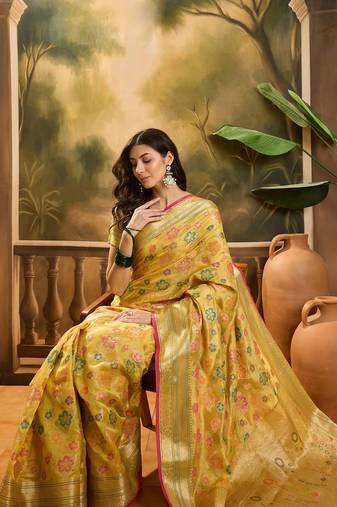 Women's gold organza zari woven saree with unstitched blouse piece