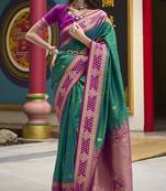 dark green banarasi silk blend saree with unstitched blouse