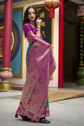 dark green banarasi silk blend saree with unstitched blouse