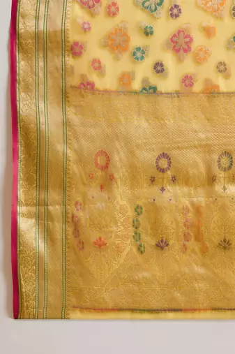 Women's gold organza zari woven saree with unstitched blouse piece