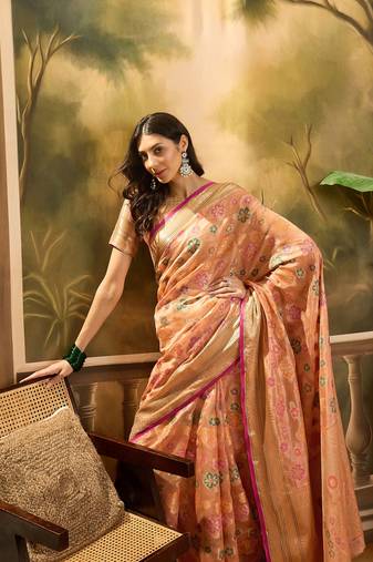 Women's peach organza zari woven saree with unstitched blouse piece
