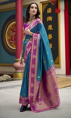 teal banarasi silk blend saree with unstitched blouse 1