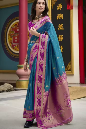 teal banarasi silk blend saree with unstitched blouse
