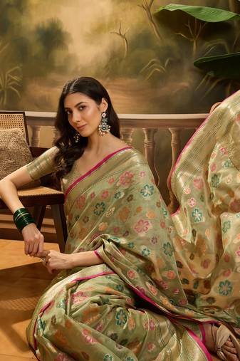 Women's pista organza zari woven saree with unstitched blouse piece