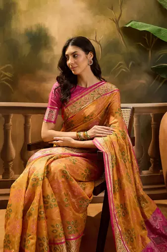 Women's mustard organza zari woven saree with unstitched blouse piece