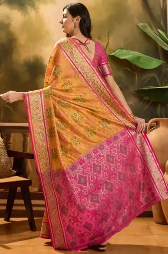 Women's mustard organza zari woven saree with unstitched blouse piece