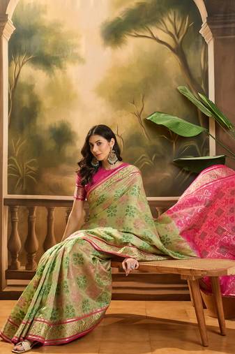 Women's pista organza zari woven saree with unstitched blouse piece