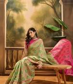 Women's pista organza zari woven saree with unstitched blouse piece