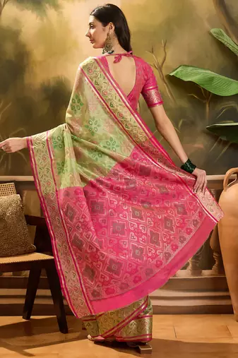Women's pista organza zari woven saree with unstitched blouse piece