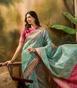 Women's sky organza zari woven saree with unstitched blouse piece