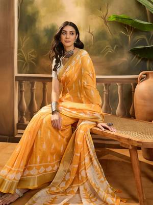 Women's orange linen printed saree with unstitched blouse piece 1