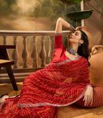 Women's red georgette bandhani saree with unstitched blouse piece