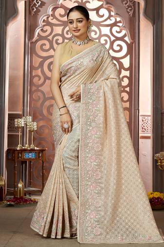 Beige organza woven embroidered saree