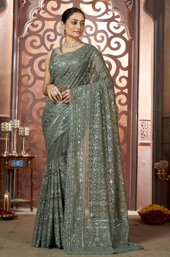 Dark green net sequin embroidered saree